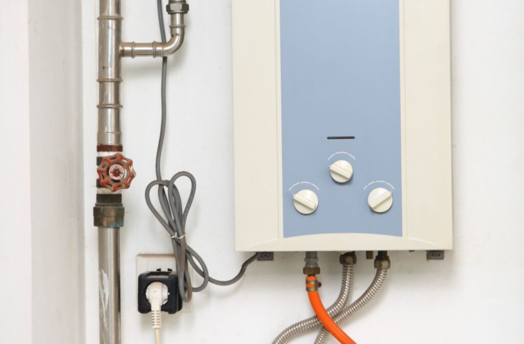 Water Heater Repair In Downingtown, PA 1 Image of water heater attached on the wall